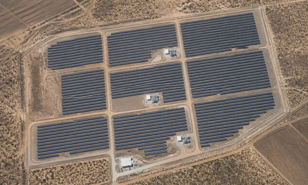 Aerial layout of the Delhi Police Rani Bagh solar power plant showing rows of panel arrays